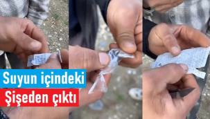 Suyun içindeki şişeden genç kadının fotoğrafı çıktı